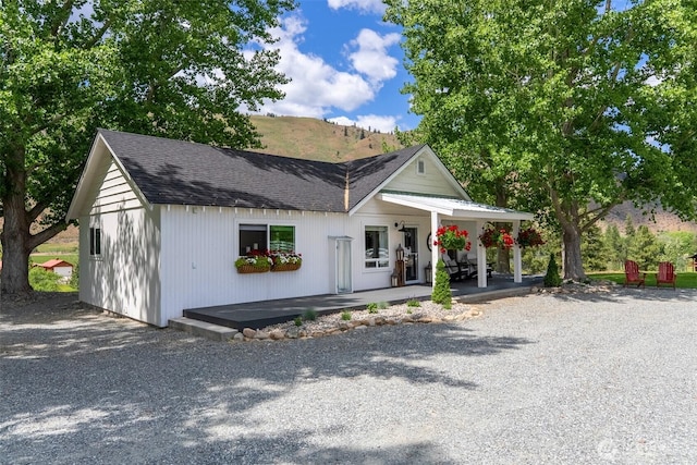 3A Ross Rd, Twisp, WA 98856 - view of front of home featuring covered porch and a shingled roof