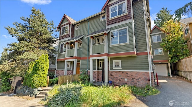 743 94th St N Unit B, Seattle, WA 98103 - multi unit property featuring brick siding, driveway, and an attached garage