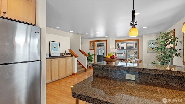 743 94th St N Unit B, Seattle, WA 98103 - kitchen featuring freestanding refrigerator, tile counters, light brown cabinetry, light wood finished floors, and recessed lighting