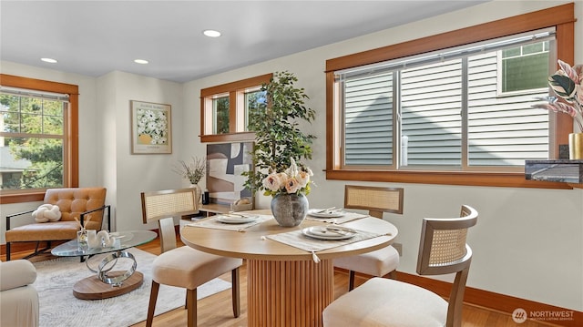 743 94th St N Unit B, Seattle, WA 98103 - dining area featuring wood finished floors and recessed lighting