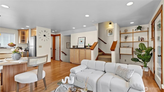 743 94th St N Unit B, Seattle, WA 98103 - living room with light wood-style floors, recessed lighting, and stairs