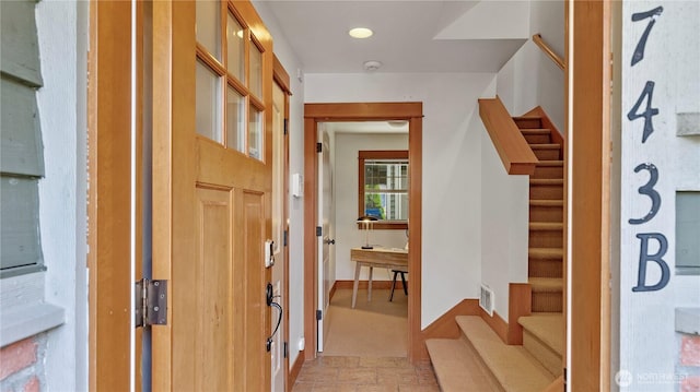 743 94th St N Unit B, Seattle, WA 98103 - entryway featuring stairs and baseboards