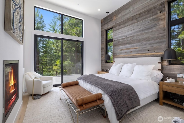 3847 Swiftwater Dr, Cle Elum, WA 98922 - bedroom with wooden walls, access to outside, and recessed lighting
