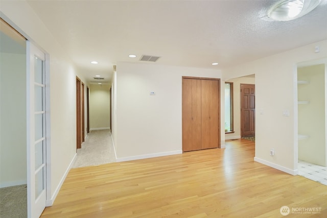 2004 SW 306th Pl, Federal Way, WA 98023 - unfurnished bedroom featuring light wood finished floors, recessed lighting, and a closet