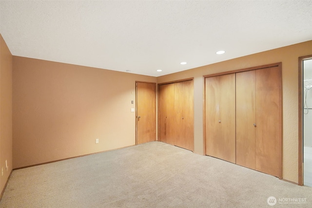 2004 SW 306th Pl, Federal Way, WA 98023 - unfurnished bedroom featuring carpet flooring, two closets, and recessed lighting
