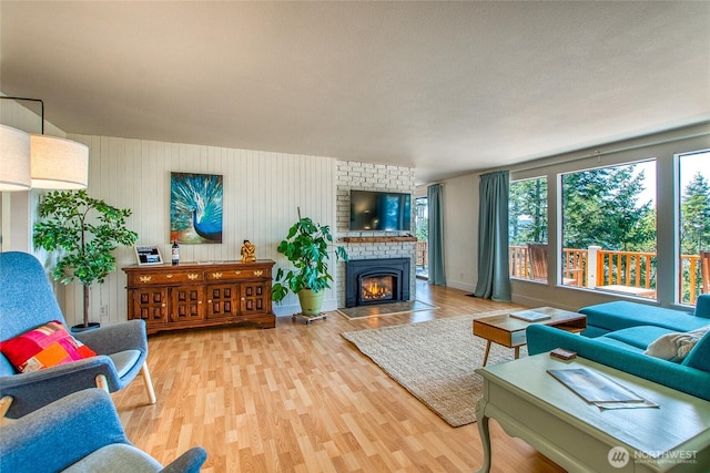 339 Highlands Dr, Orcas Island, WA 98245 - living area with light wood-style flooring and a fireplace
