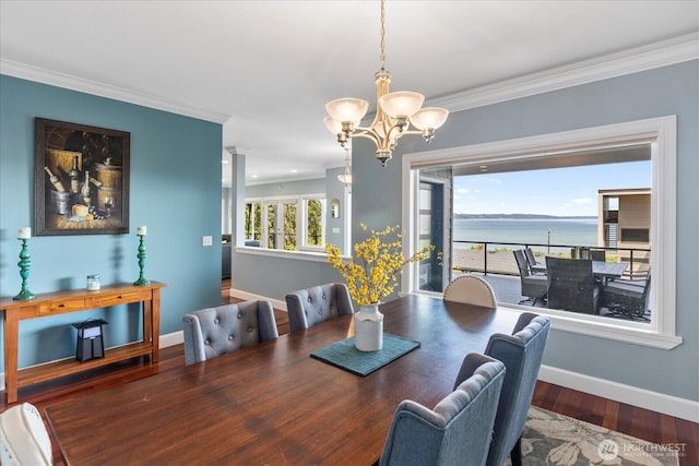 3811 N Dale St, Tacoma, WA 98407 - dining room with a chandelier, crown molding, wood finished floors, and a water view
