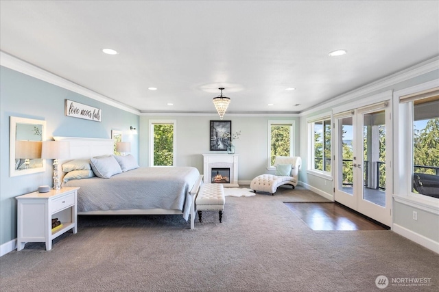 3811 N Dale St, Tacoma, WA 98407 - carpeted bedroom featuring ornamental molding, access to outside, french doors, recessed lighting, and a high end fireplace