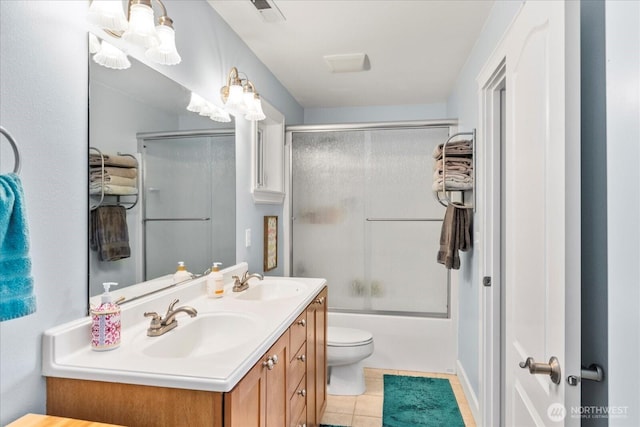 3811 N Dale St, Tacoma, WA 98407 - full bath featuring double vanity, tile patterned flooring, and enclosed tub / shower combo
