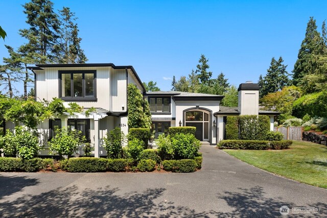 8234 NE 8th St, Medina, WA 98039 - view of front facade with a chimney