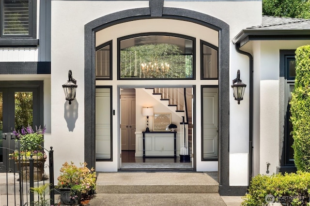 8234 NE 8th St, Medina, WA 98039 - view of exterior entry with stucco siding and french doors