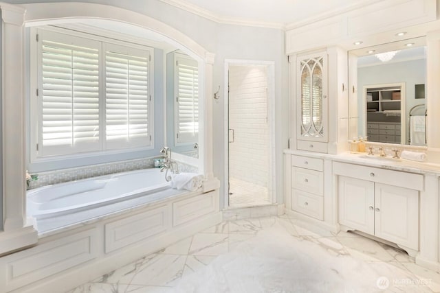 8234 NE 8th St, Medina, WA 98039 - bathroom featuring a bath, crown molding, a stall shower, healthy amount of natural light, and vanity