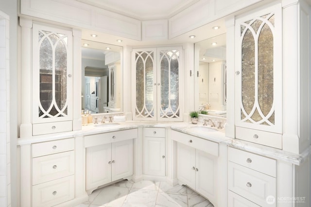 8234 NE 8th St, Medina, WA 98039 - full bathroom featuring double vanity, marble look tiles, crown molding, and healthy amount of natural light