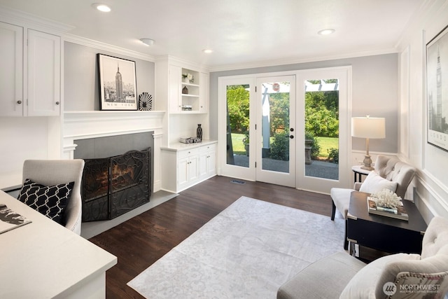 8234 NE 8th St, Medina, WA 98039 - living room with dark wood-type flooring, a fireplace, crown molding, french doors, and recessed lighting