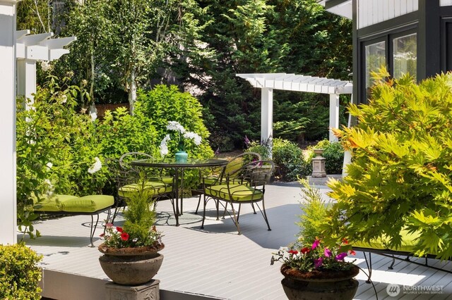 8234 NE 8th St, Medina, WA 98039 - wooden terrace featuring outdoor dining space