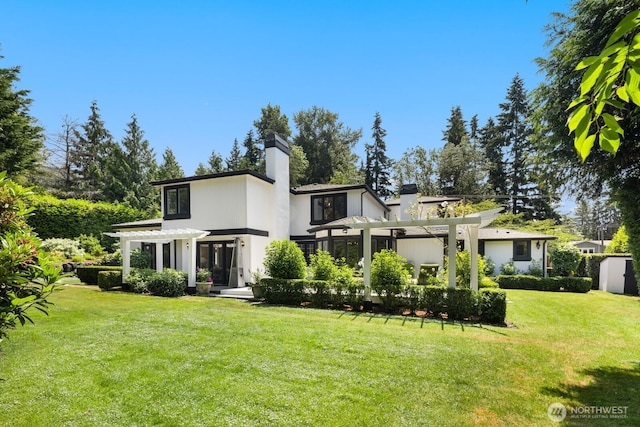 8234 NE 8th St, Medina, WA 98039 - back of house featuring a pergola, a chimney, and a yard