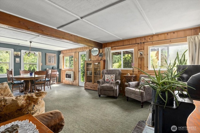 48911 Mountain Loop Hwy, Granite Falls, WA 98252 - living area with plenty of natural light, carpet flooring, heating unit, beamed ceiling, and wood walls