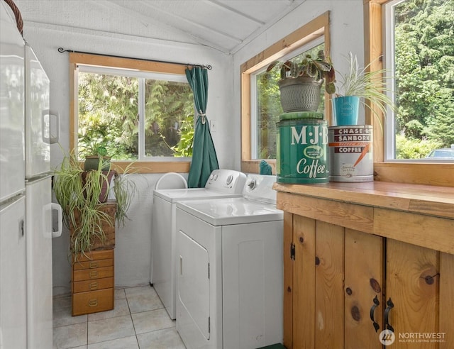 48911 Mountain Loop Hwy, Granite Falls, WA 98252 - laundry area featuring independent washer and dryer, light tile patterned flooring, and healthy amount of natural light