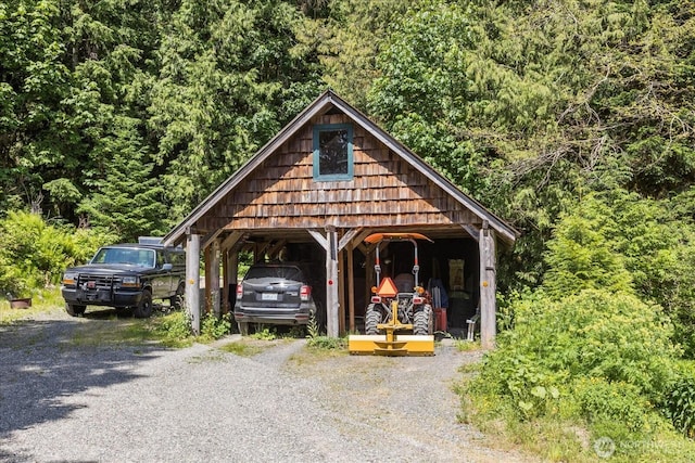 48911 Mountain Loop Hwy, Granite Falls, WA 98252 - view of outbuilding featuring gravel driveway and a forest view