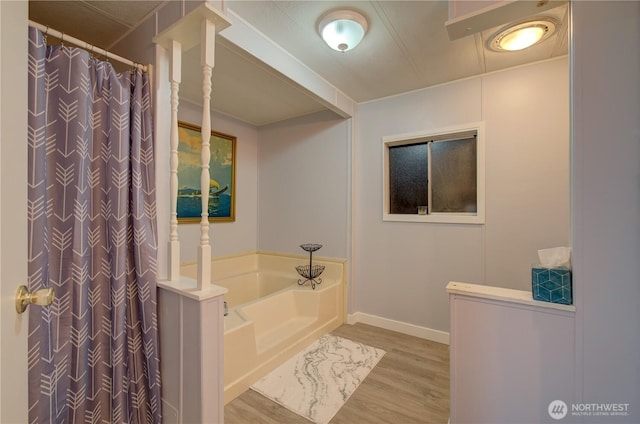1411 297th Ln, Ocean Park, WA 98640 - full bath with wood finished floors, a bath, and a shower with shower curtain