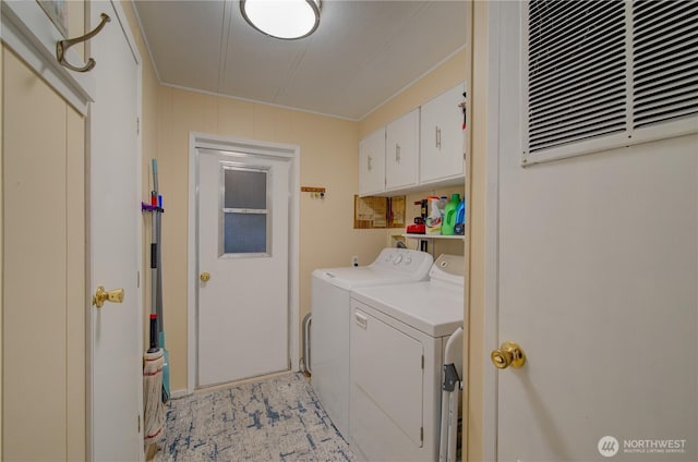 1411 297th Ln, Ocean Park, WA 98640 - washroom with cabinet space, washer and clothes dryer, crown molding, and a heating unit