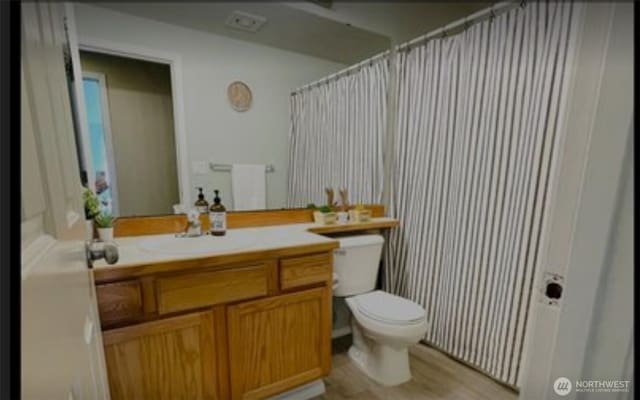 1009 112th St Unit D304, Everett, WA 98208 - bathroom featuring vanity and wood finished floors
