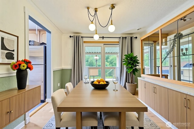 21520 36th Avenue Ct E, Spanaway, WA 98387 - dining room featuring light wood finished floors