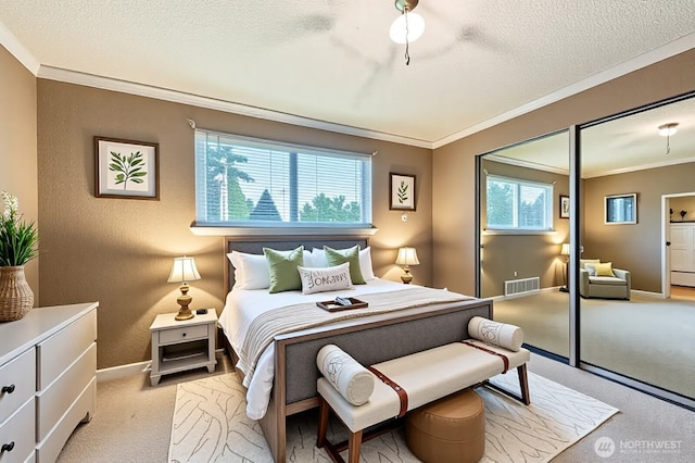 21520 36th Avenue Ct E, Spanaway, WA 98387 - bedroom featuring ornamental molding, light carpet, and a textured ceiling