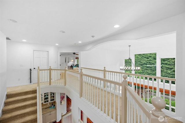 1402 180th Ave E, Lake Tapps, WA 98391 - hallway with recessed lighting, a chandelier, and carpet flooring