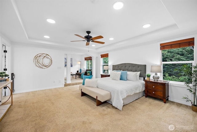 1402 180th Ave E, Lake Tapps, WA 98391 - bedroom with a raised ceiling, recessed lighting, light colored carpet, and a ceiling fan