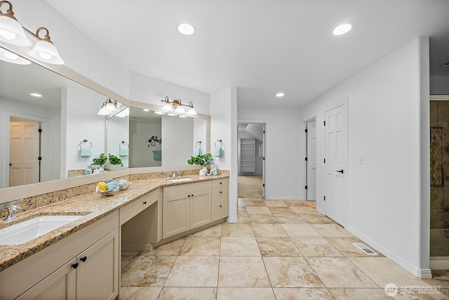1402 180th Ave E, Lake Tapps, WA 98391 - full bathroom featuring double vanity, recessed lighting, and a tile shower