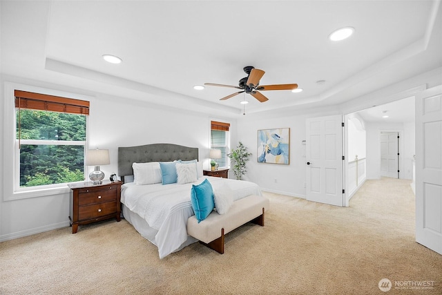 1402 180th Ave E, Lake Tapps, WA 98391 - bedroom with a tray ceiling, light carpet, recessed lighting, and ceiling fan