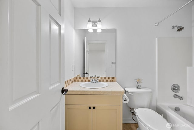 1402 180th Ave E, Lake Tapps, WA 98391 - bathroom with vanity, shower / bathtub combination, and tasteful backsplash