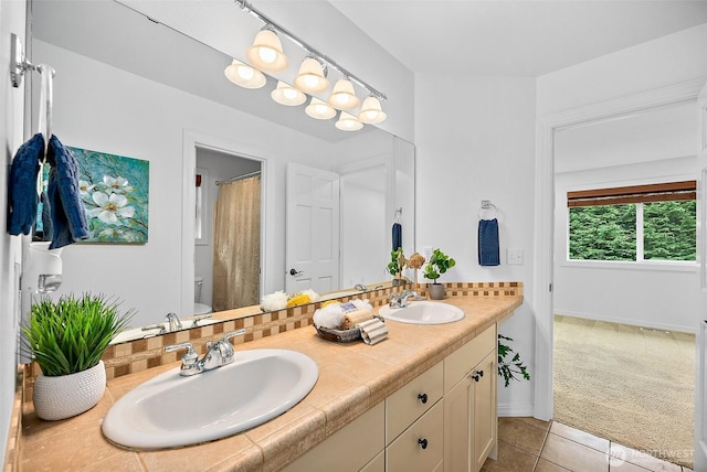 1402 180th Ave E, Lake Tapps, WA 98391 - full bath featuring double vanity and tile patterned floors