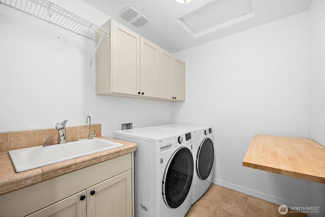 1402 180th Ave E, Lake Tapps, WA 98391 - laundry area featuring cabinet space, washer and dryer, and attic access