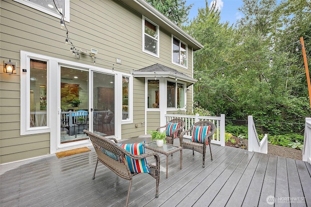 1402 180th Ave E, Lake Tapps, WA 98391 - wooden terrace with an outdoor living space