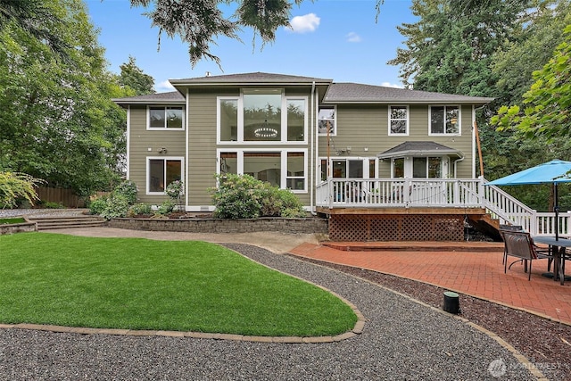 1402 180th Ave E, Lake Tapps, WA 98391 - back of house with a patio area and a wooden deck