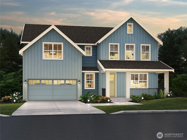 544 SW 97th St Unit 5, Seattle, WA 98106 - view of front of house featuring an attached garage, board and batten siding, driveway, and a shingled roof