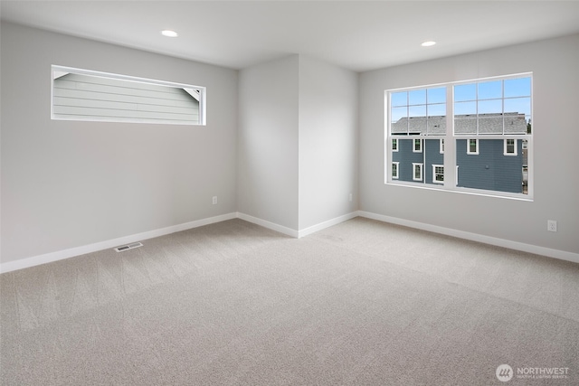 544 SW 97th St Unit 5, Seattle, WA 98106 - spare room with carpet and recessed lighting