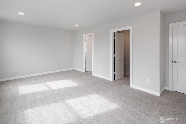 544 SW 97th St Unit 5, Seattle, WA 98106 - unfurnished bedroom with carpet floors and recessed lighting
