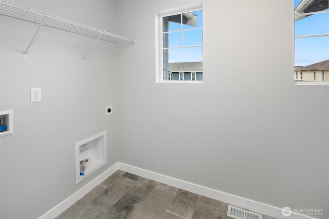544 SW 97th St Unit 5, Seattle, WA 98106 - laundry room featuring hookup for a washing machine, hookup for an electric dryer, and healthy amount of natural light