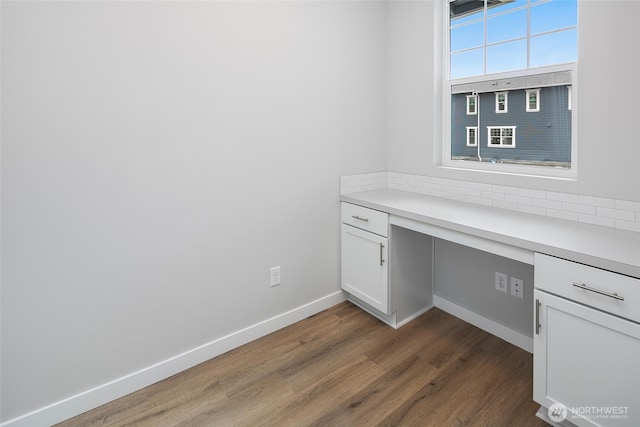 544 SW 97th St Unit 5, Seattle, WA 98106 - unfurnished office with built in study area and wood finished floors