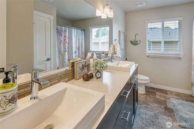 24220 93rd Ct S, Kent, WA 98030 - full bath featuring double vanity, stone finish floors, and curtained shower