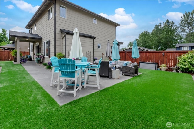 24220 93rd Ct S, Kent, WA 98030 - back of property featuring a patio, outdoor lounge area, and a fenced backyard