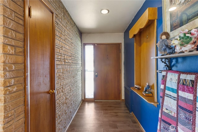 308 2nd Ave, Harrington, WA 99134 - foyer with wood finished floors and brick wall