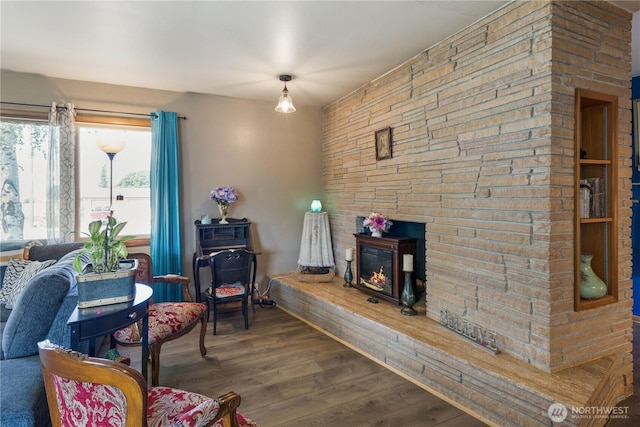308 2nd Ave, Harrington, WA 99134 - sitting room featuring wood finished floors and a stone fireplace