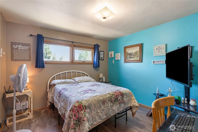 308 2nd Ave, Harrington, WA 99134 - bedroom featuring wood finished floors and baseboards