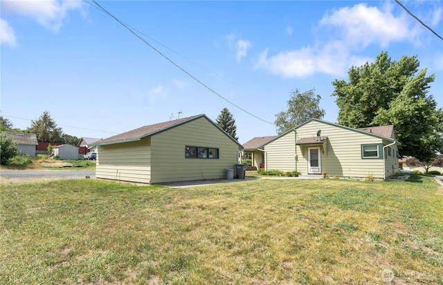 308 2nd Ave, Harrington, WA 99134 - rear view of property featuring a lawn