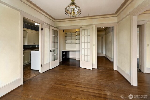 1902 Bigelow Ave N Unit 301, Seattle, WA 98109 - hallway with french doors, dark wood-style flooring, ornamental molding, and a chandelier