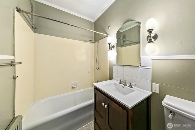 1902 Bigelow Ave N Unit 301, Seattle, WA 98109 - bathroom with tile walls, vanity, shower / washtub combination, ornamental molding, and decorative backsplash